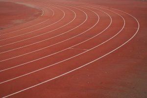 (Empty) Lanes on track on a gym field.