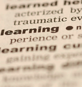 picture of a dictionary page with the word 'learning' highlighted